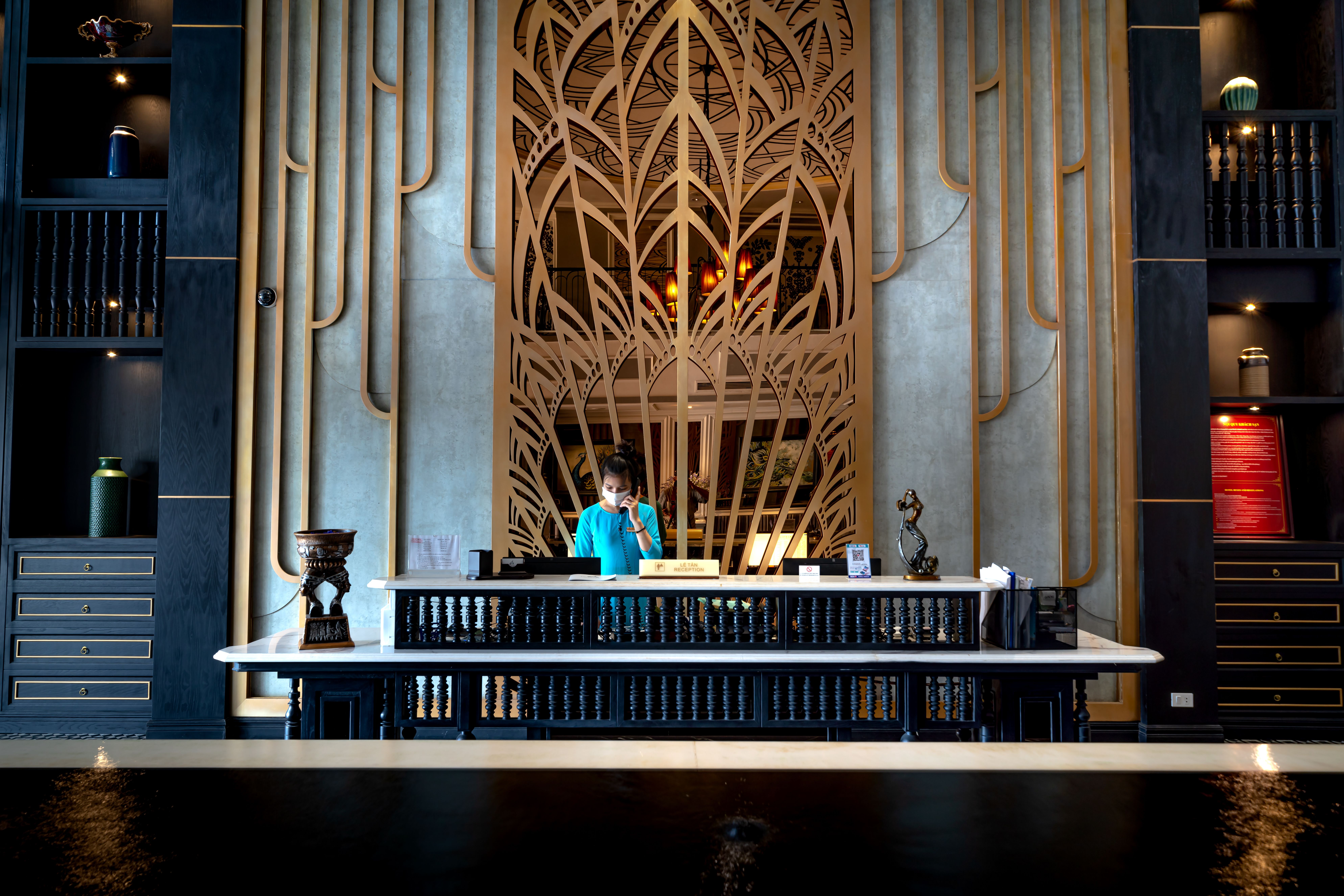 Elegant hotel reception where a concierge can arrange personalized guest experiences.