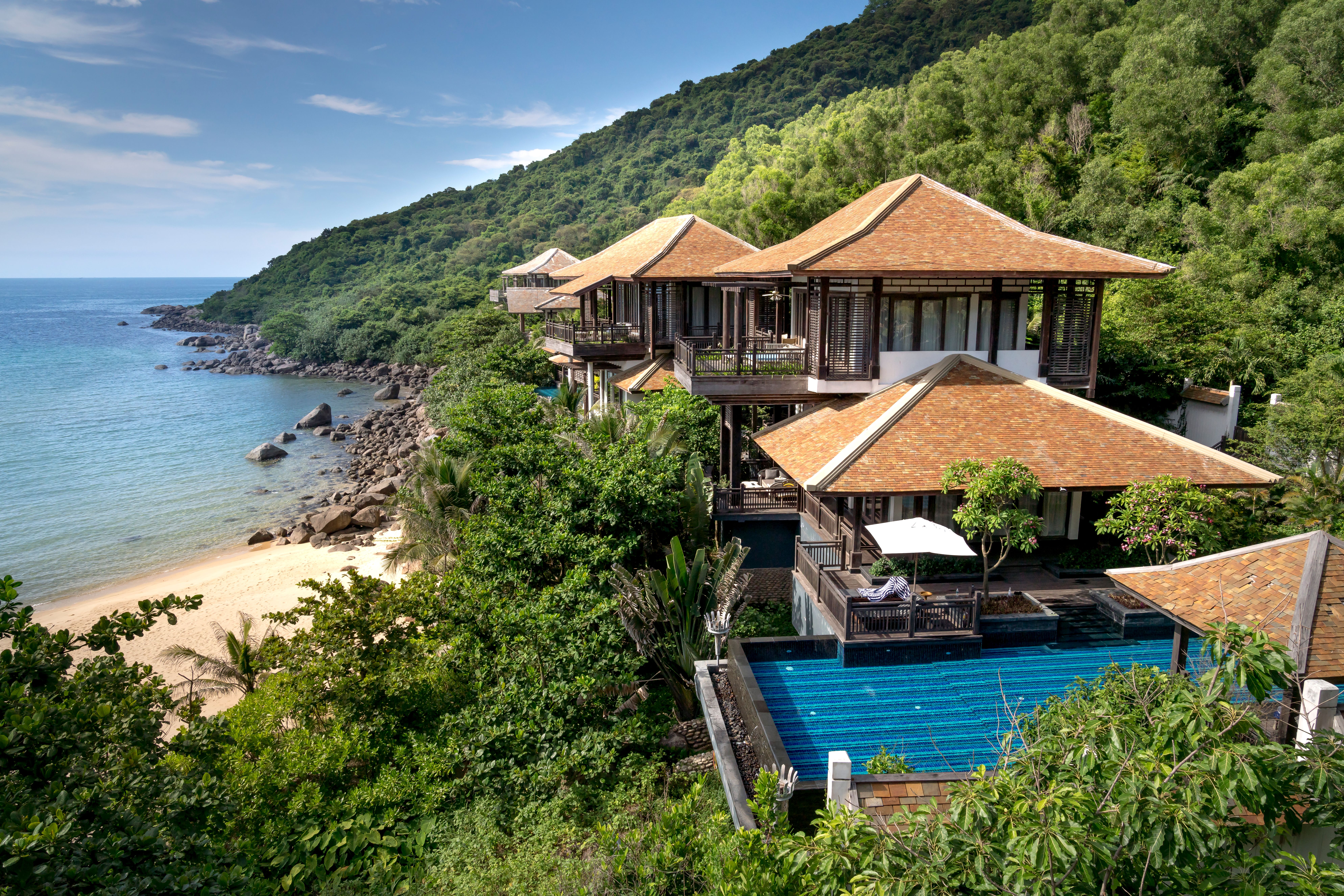 Tropical luxury villa with a private pool and direct beach access.
